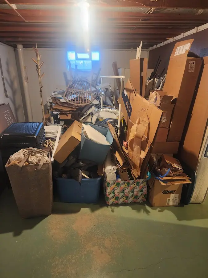 Roll-off dumpster container at job site for 6 Yard Dumpster Rental in Marshfield